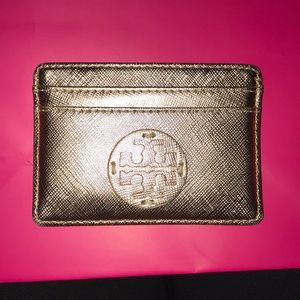 Tory Burch rose gold car holder